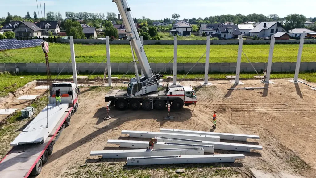 Wynajem dźwigu 100 ton Łódź rozładunek prefabrykatów betonowych z naczepy ciężarówki